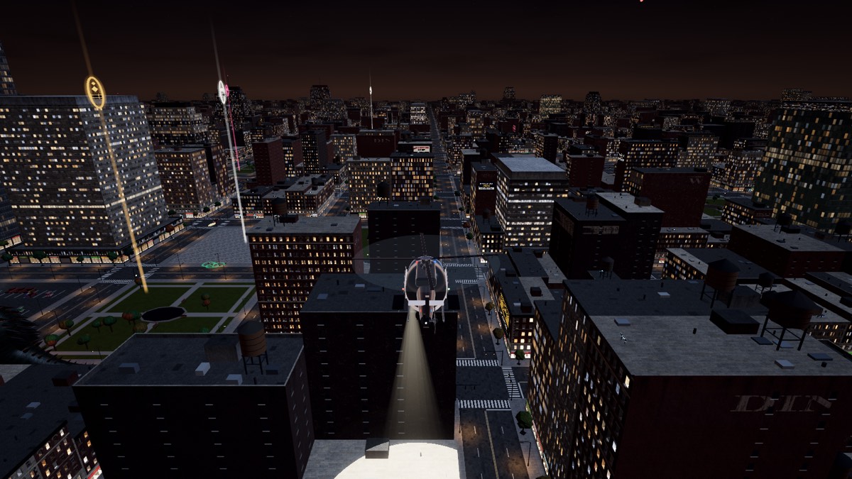 The helicopter's searchlight lights up a rooftop in the night-time city